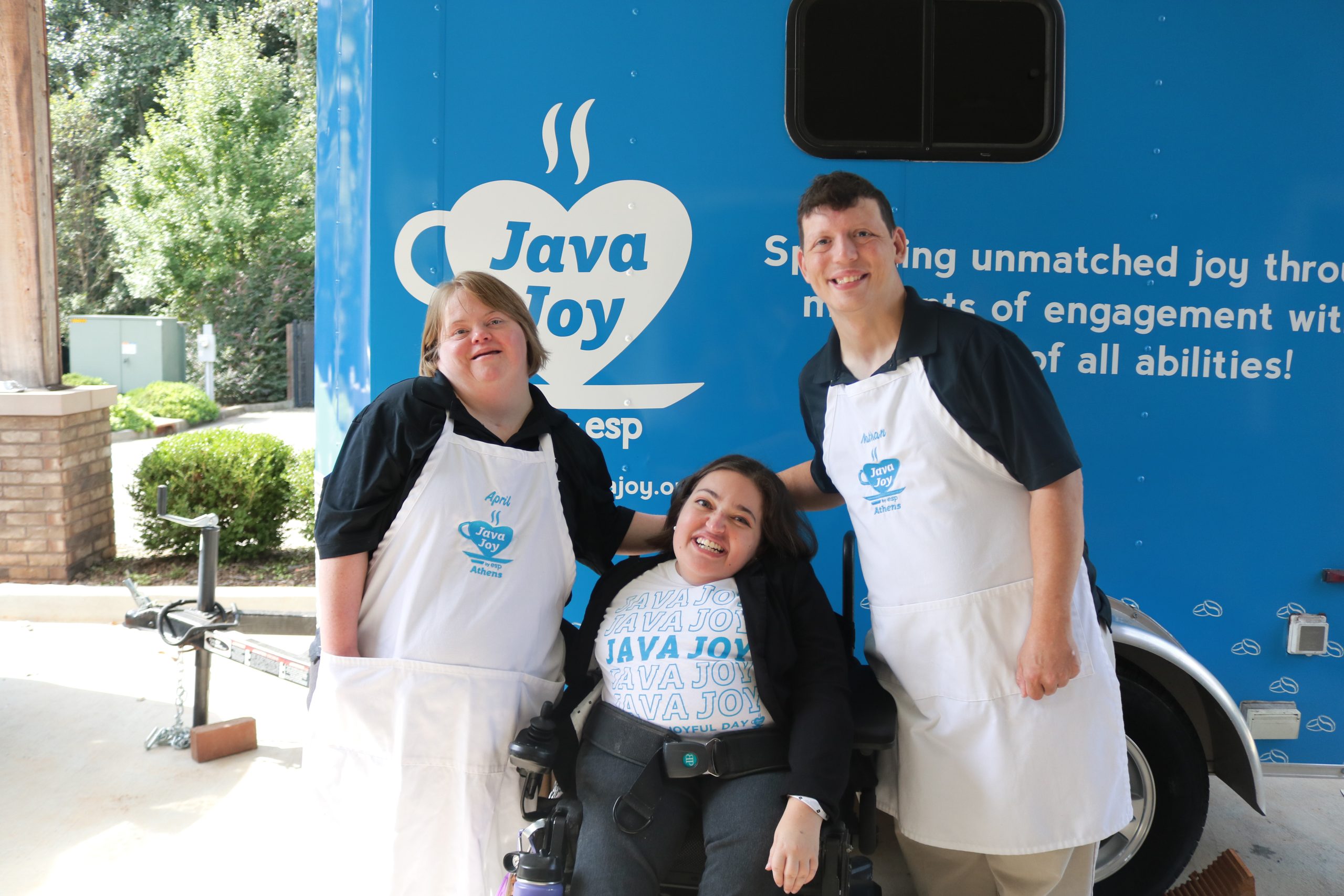 a group of people posing for a picture for java joy