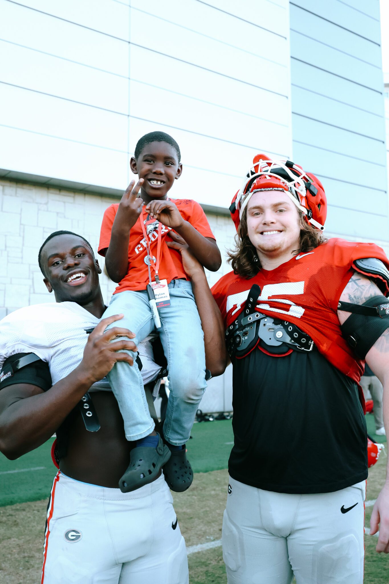 georgia bulldog players with friend