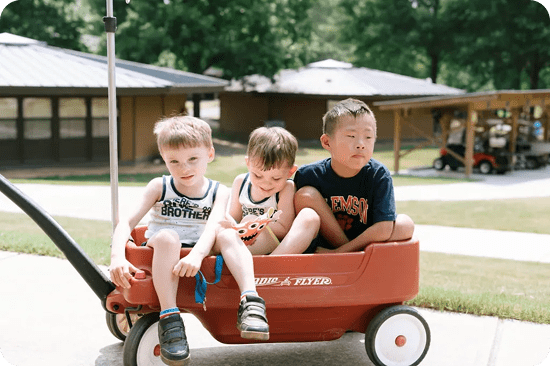 kids in a wagon