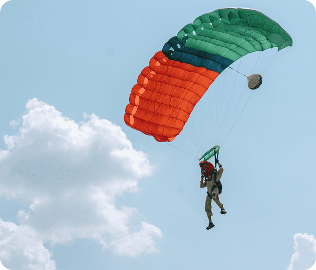 parachute man in dinosaur mask