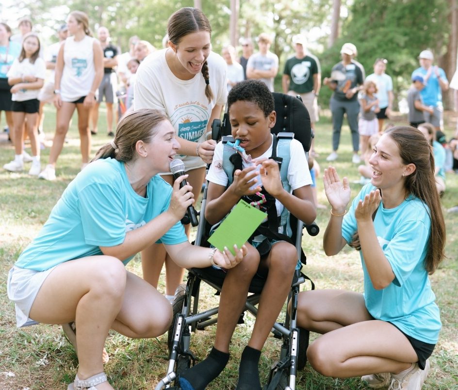 a camper being celebrated